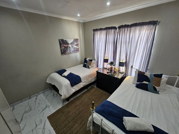 Sunset 6. Twin with Shared Bathroom